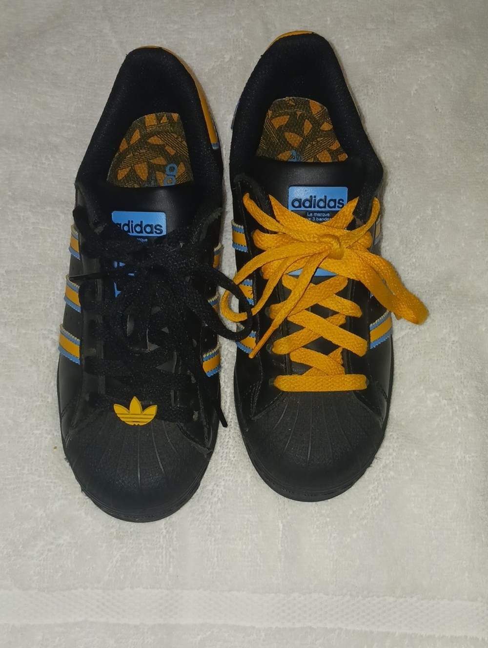 adidas Kids Black Sneakers with Yellow and Blue Accents